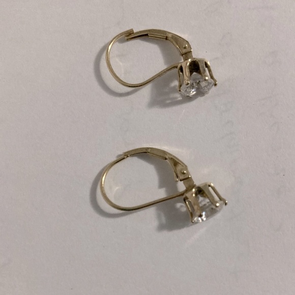 Costume diamond clawback earrings.
